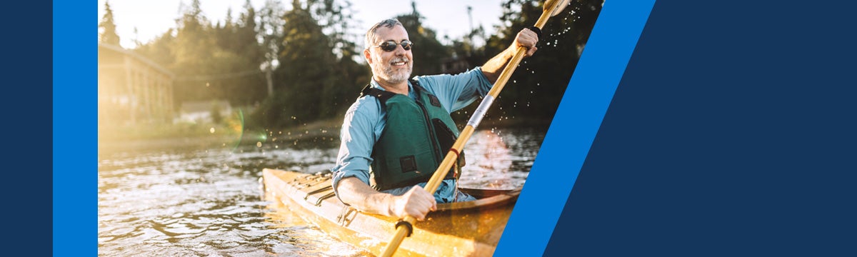 Man in glasses kayaking