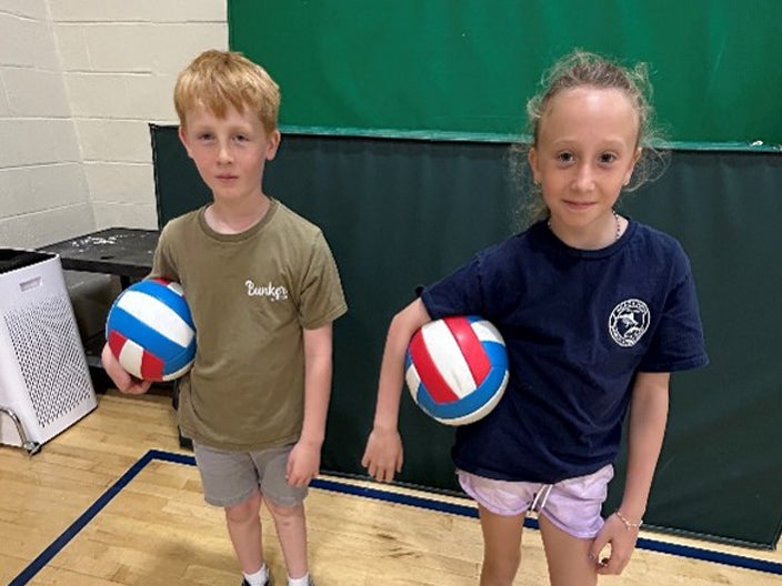 Beach Haven School students holding volley balls