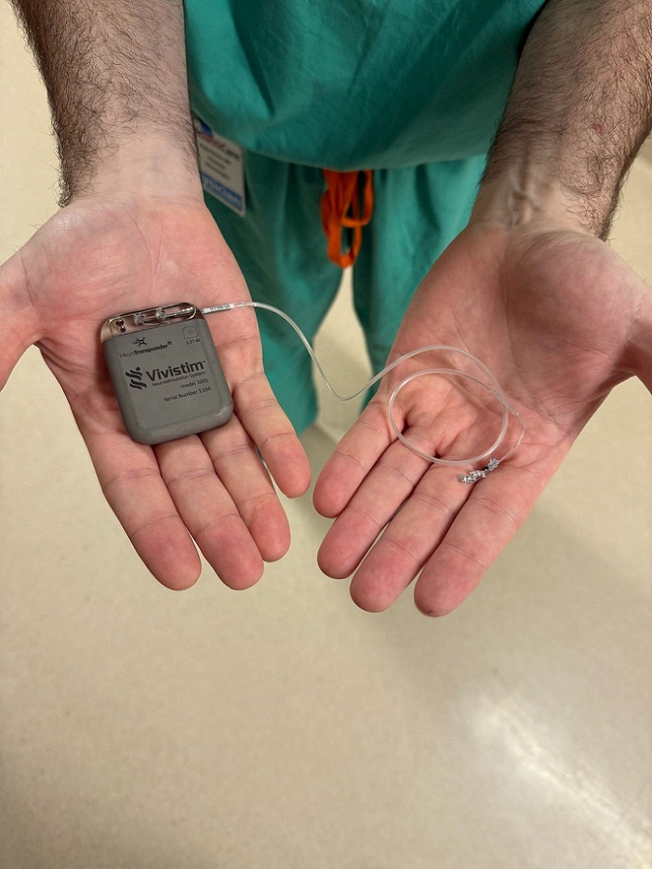device in doctor's hand