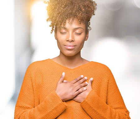 Woman holding heart